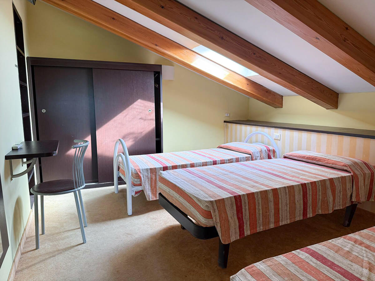 Camera Family Mansardata per 5 Persone Hotel San Carlo