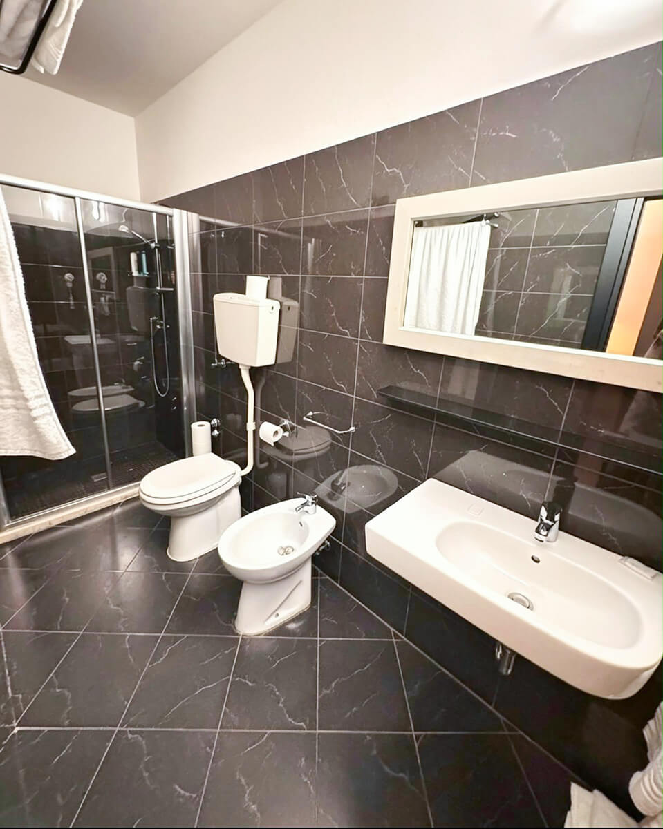 Camera Tripla Mansardata Hotel San Carlo